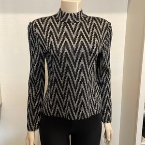 St John Evening. Black silver knit top. Size 2